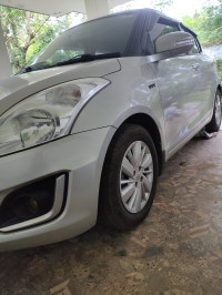Bluish Silver Maruti Suzuki Swift ZXi