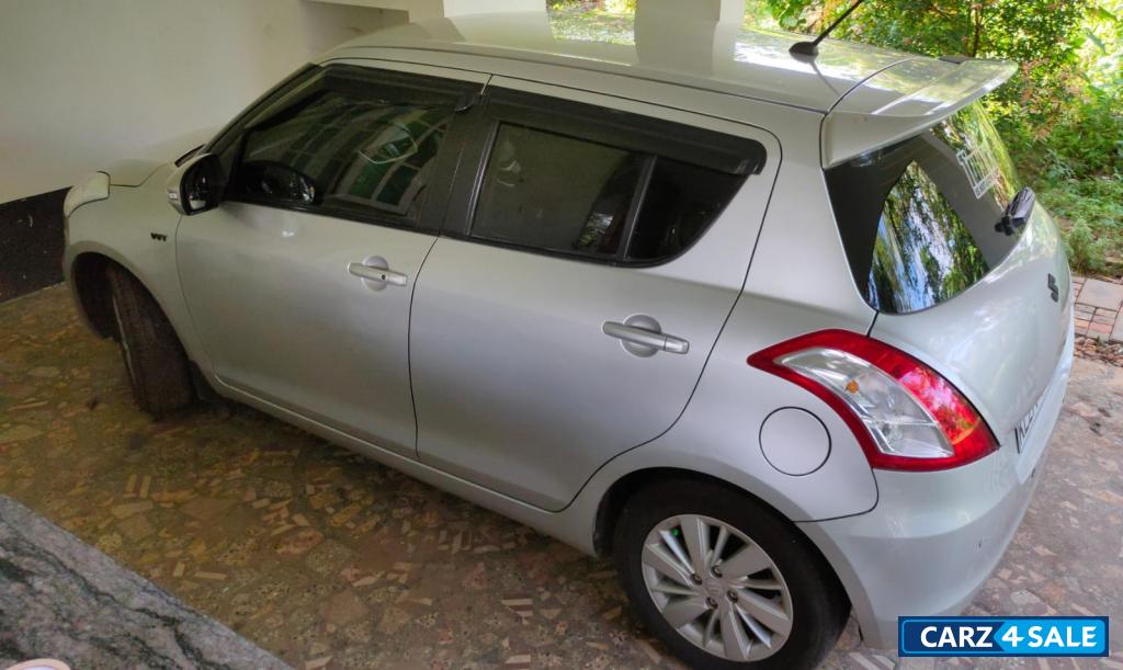 Bluish Silver Maruti Suzuki Swift ZXi