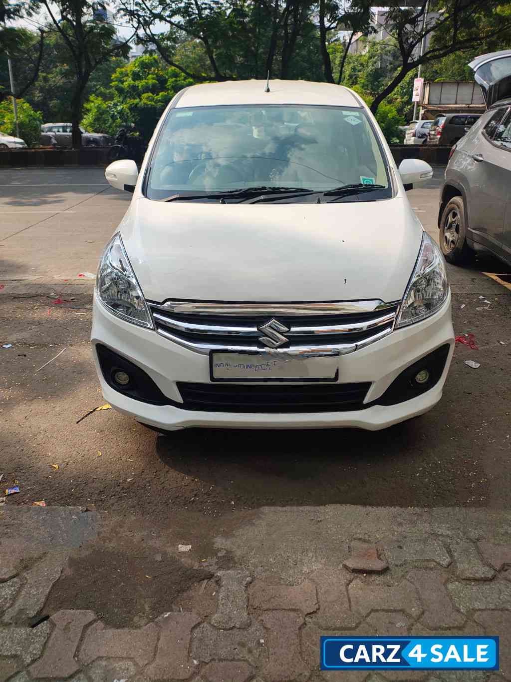 White Maruti Suzuki Ertiga VXI CNG