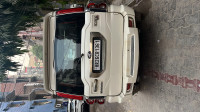 White Mahindra Scorpio S6 Plus