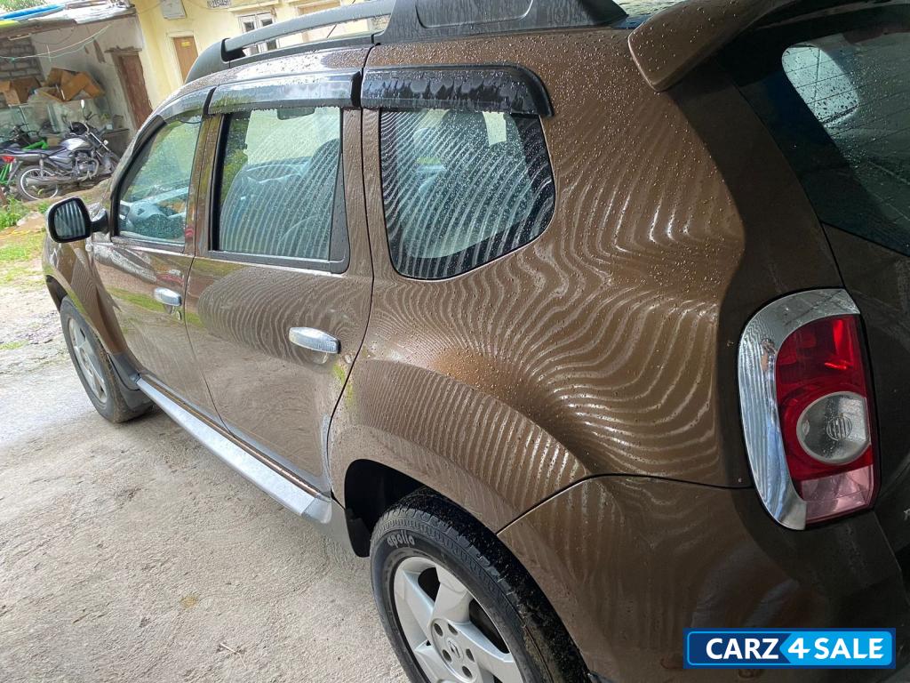 Gold Renault Duster RXZ 110 PS Manual 2013