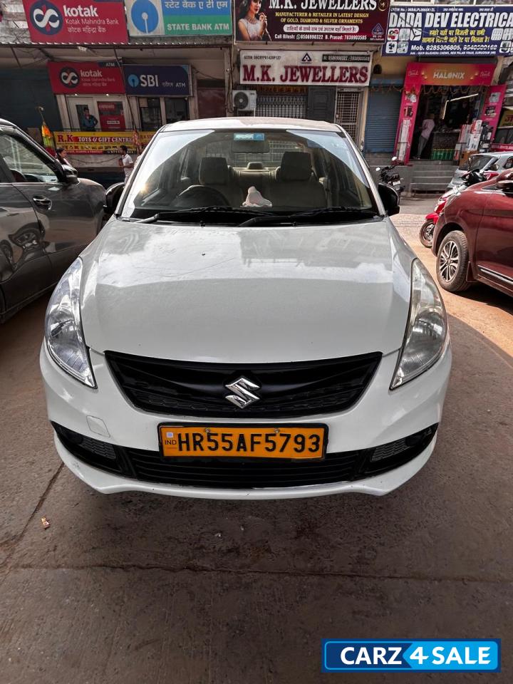 Pearl White Maruti Suzuki Dzire tour s cng