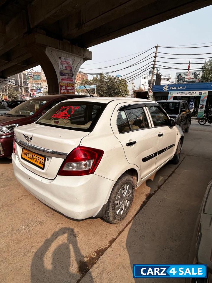 Pearl White Maruti Suzuki Dzire tour s cng