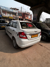 Pearl White Maruti Suzuki Dzire tour s cng