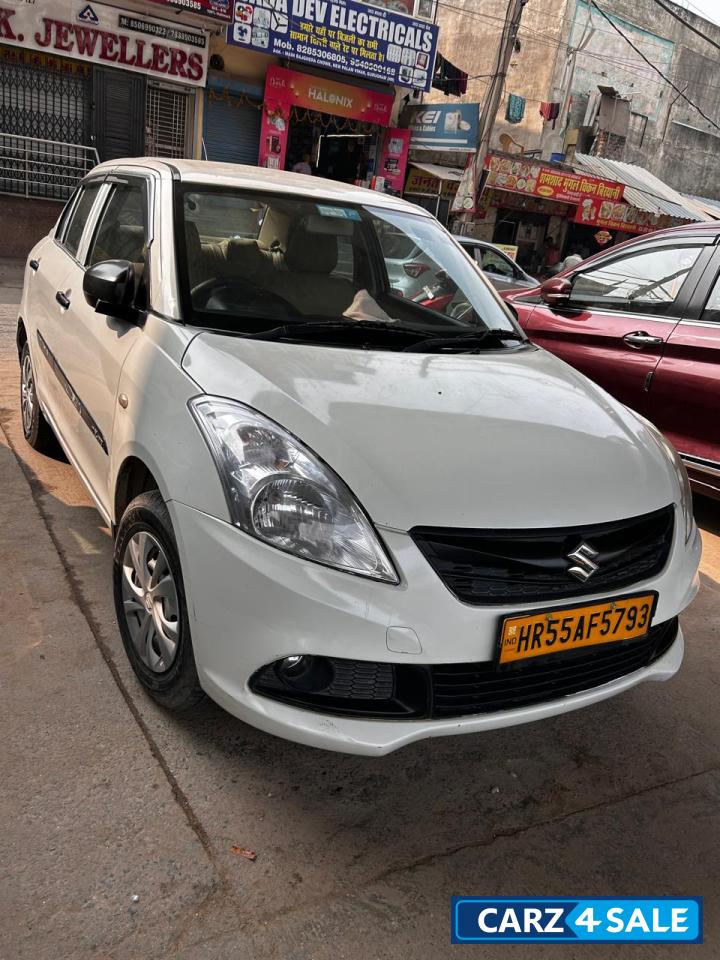 Pearl White Maruti Suzuki Dzire tour s cng