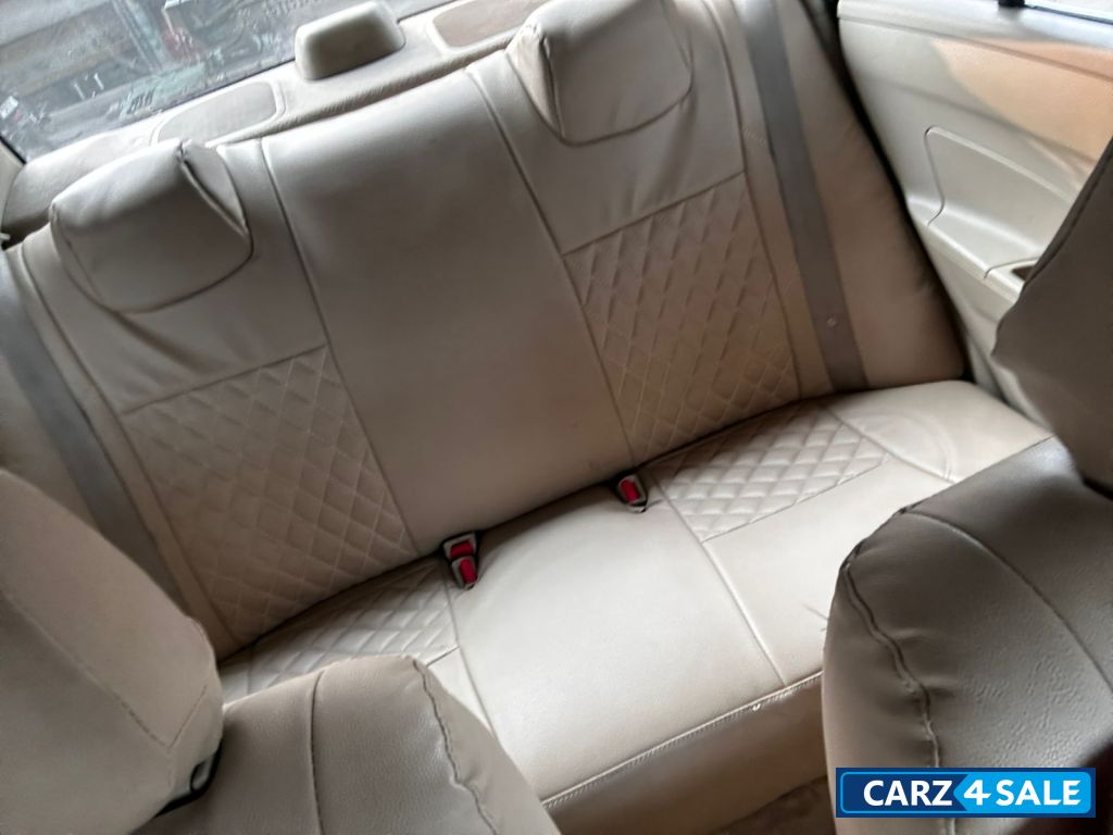 Pearl White Maruti Suzuki Dzire tour s cng