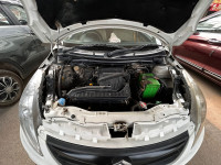 Pearl White Maruti Suzuki Dzire tour s cng