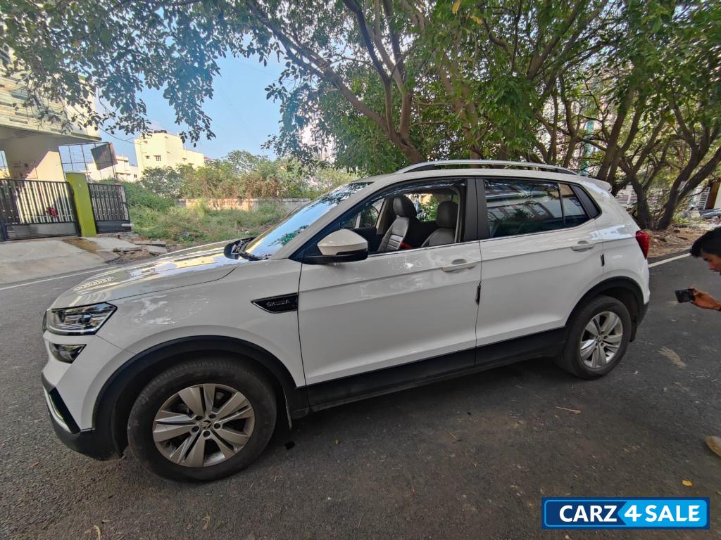 White Skoda Kushaq Ambition