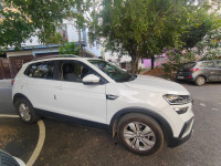 White Skoda Kushaq Ambition