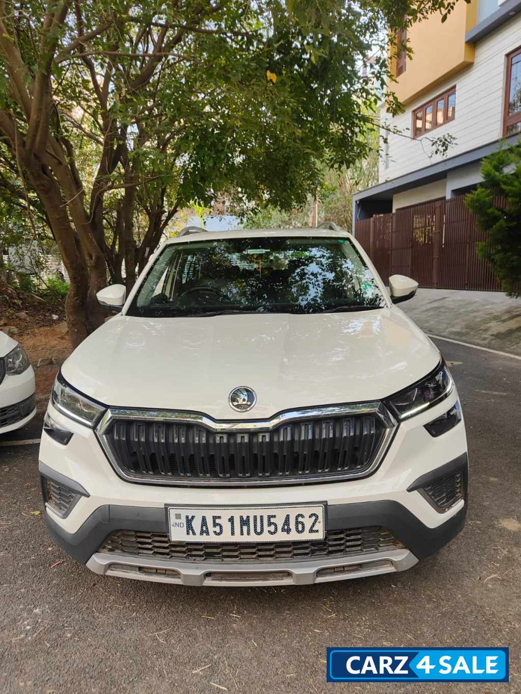 White Skoda Kushaq Ambition