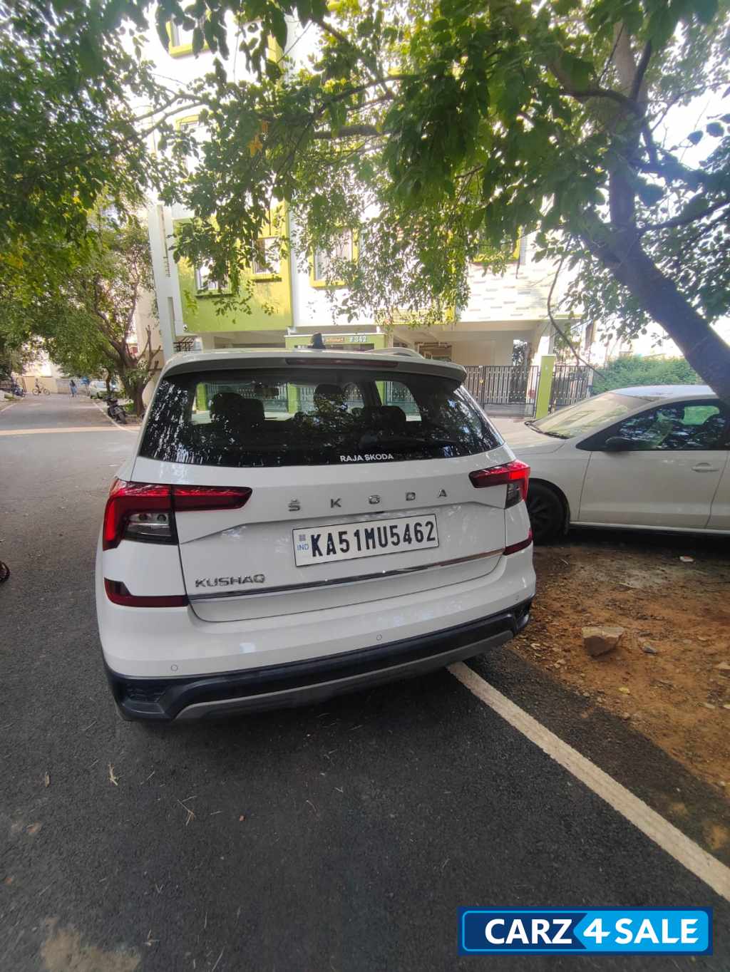 White Skoda Kushaq Ambition