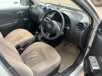 Silver Nissan Micra XE