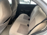 Silver Nissan Micra XE