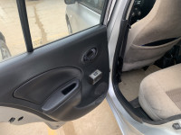 Silver Nissan Micra XE