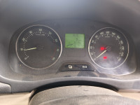 Red Skoda Fabia 1.6L