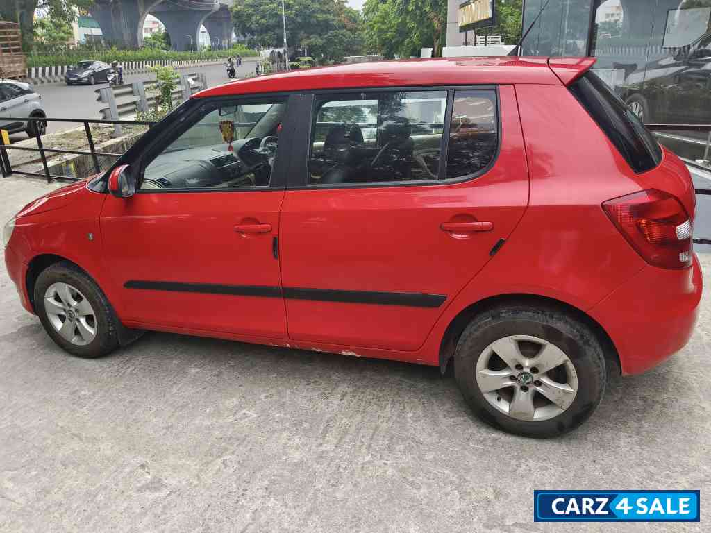 Red Skoda Fabia 1.6L
