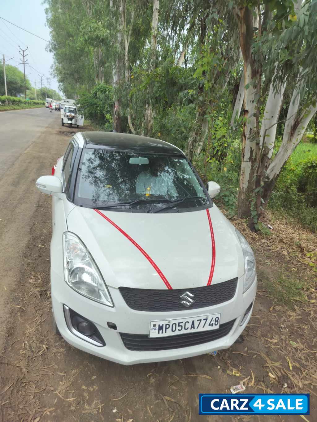 White Maruti Suzuki Swift VXI White Maruti Suzuki Swift VXI