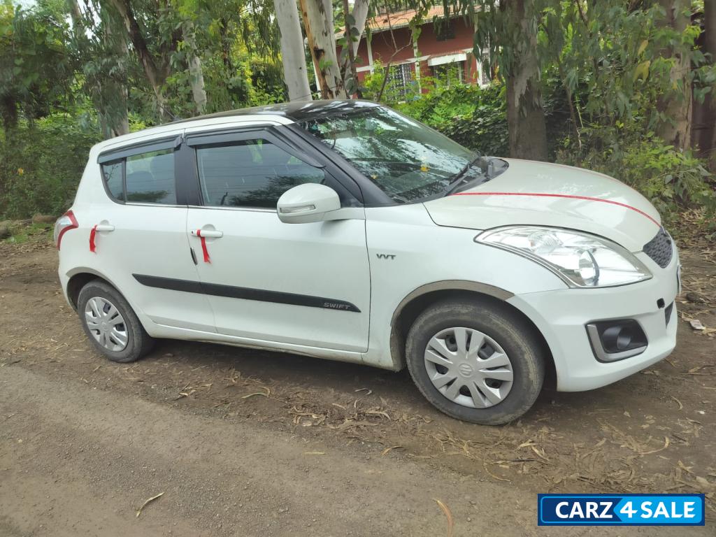 White Maruti Suzuki Swift VXI White Maruti Suzuki Swift VXI