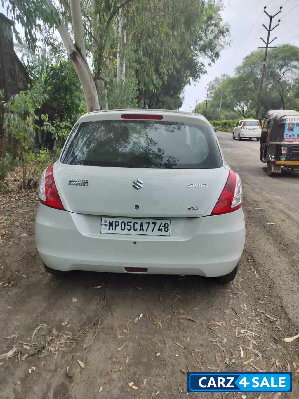 White Maruti Suzuki Swift VXI White Maruti Suzuki Swift VXI