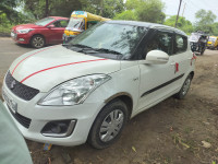 White Maruti Suzuki Swift VXI