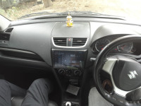 White Maruti Suzuki Swift VXI