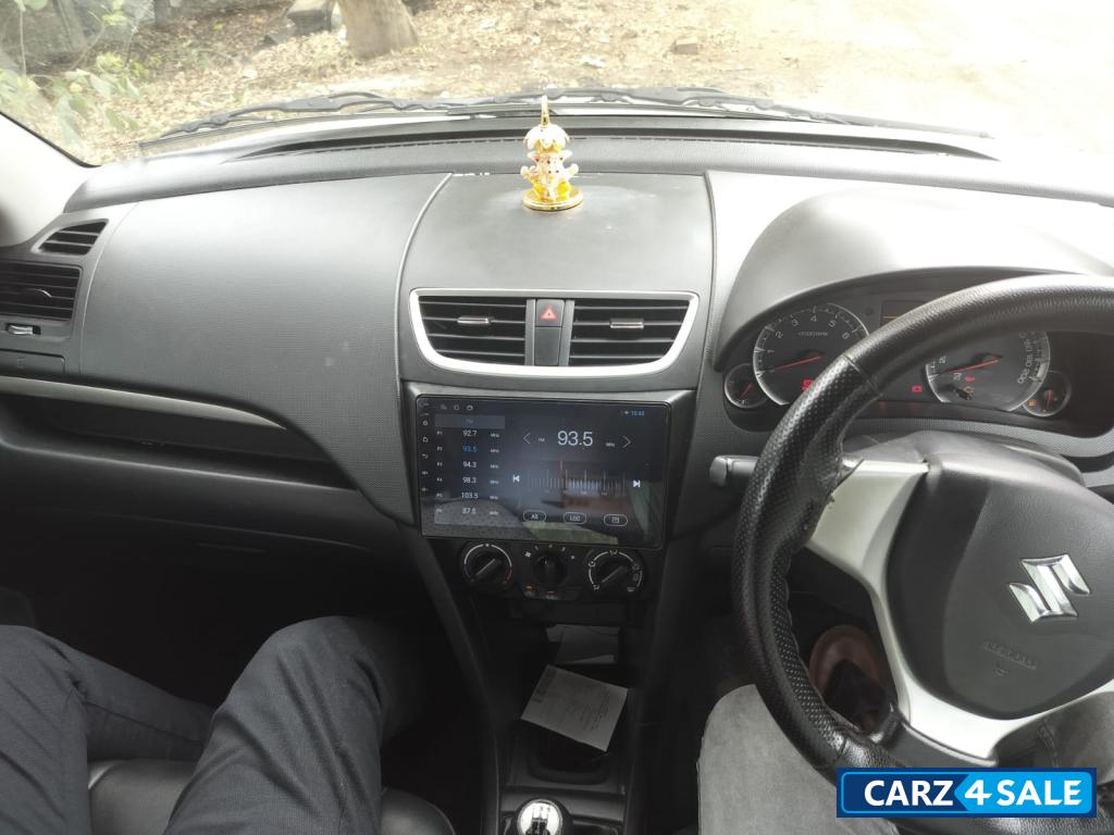 White Maruti Suzuki Swift VXI White Maruti Suzuki Swift VXI