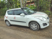 White Maruti Suzuki Swift VXI