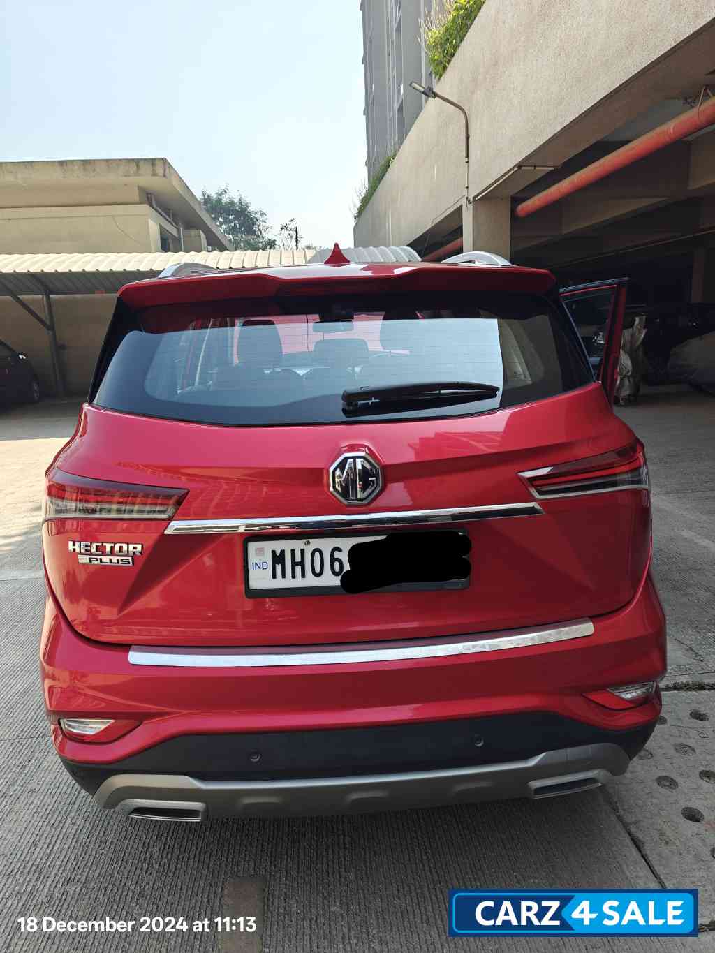 Red MG Hector Plus Smart 2.0 Diesel 7 Seater