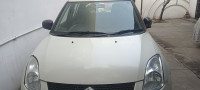 White Maruti Suzuki Swift Vxi