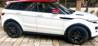 White And Red Land Rover Range Rover Evoque