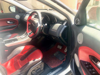 White And Red Land Rover Range Rover Evoque
