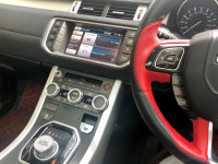 White And Red Land Rover Range Rover Evoque