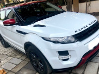 White And Red Land Rover Range Rover Evoque