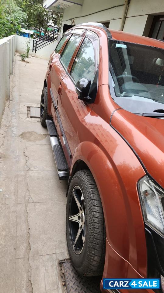 Orange Mahindra XUV 500 W4