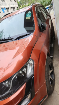 Orange Mahindra XUV 500 W4