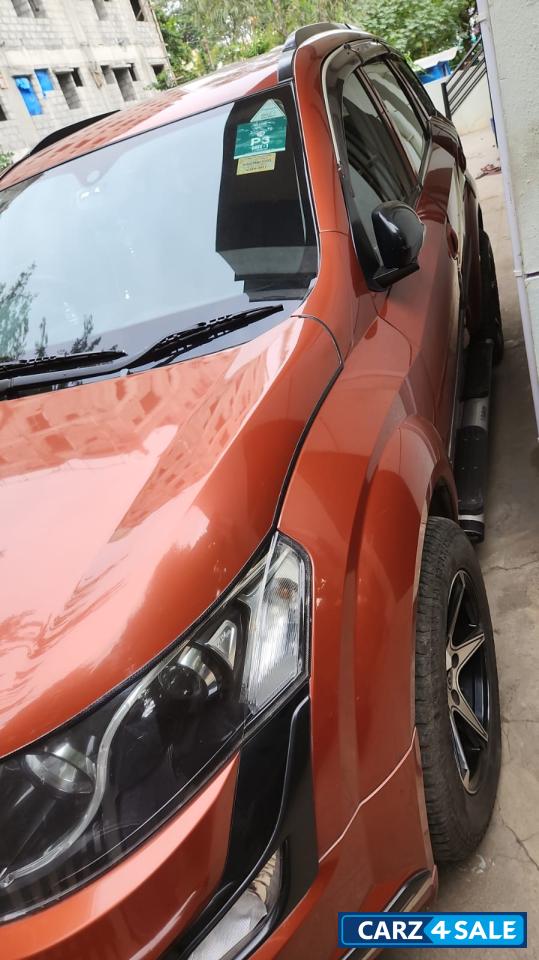 Orange Mahindra XUV 500 W4