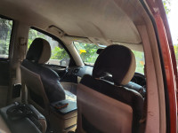 Orange Mahindra XUV 500 W4