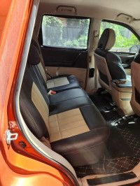 Orange Mahindra XUV 500 W4