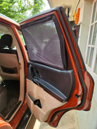 Orange Mahindra XUV 500 W4
