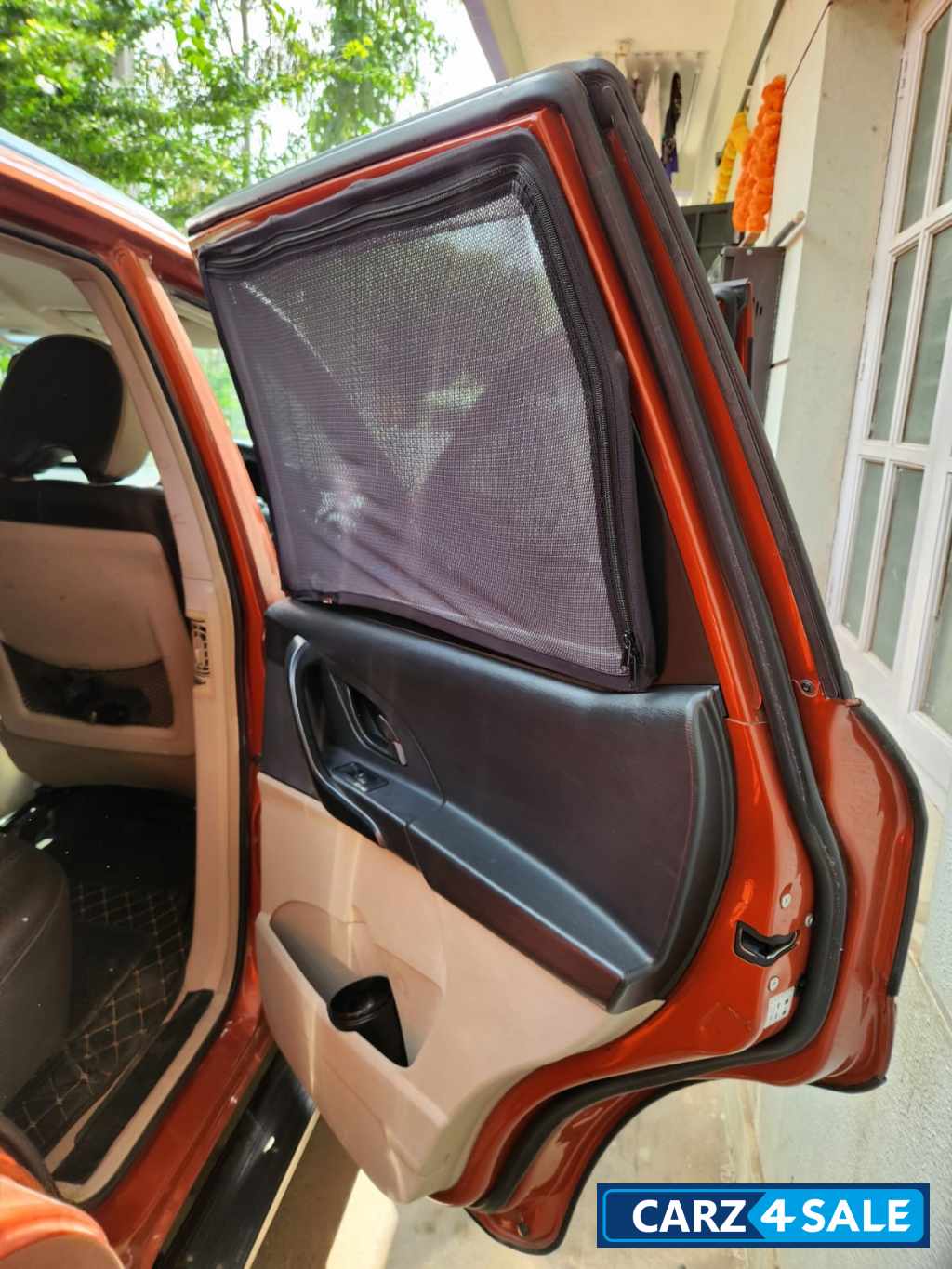 Orange Mahindra XUV 500 W4