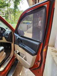 Orange Mahindra XUV 500 W4