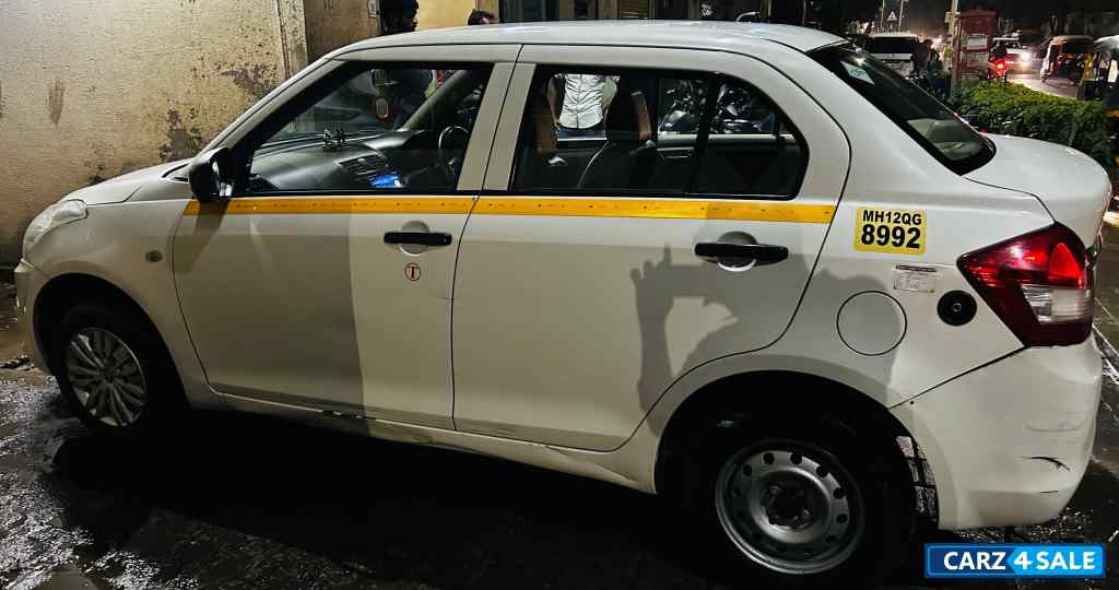 Pearl White Maruti Suzuki Dzire Tour s