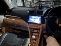 Pearl White Maruti Suzuki Dzire Tour s