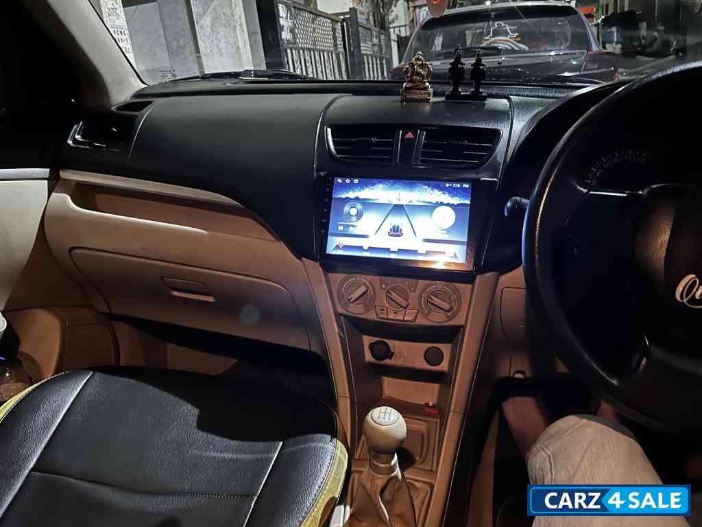 Pearl White Maruti Suzuki Dzire Tour s