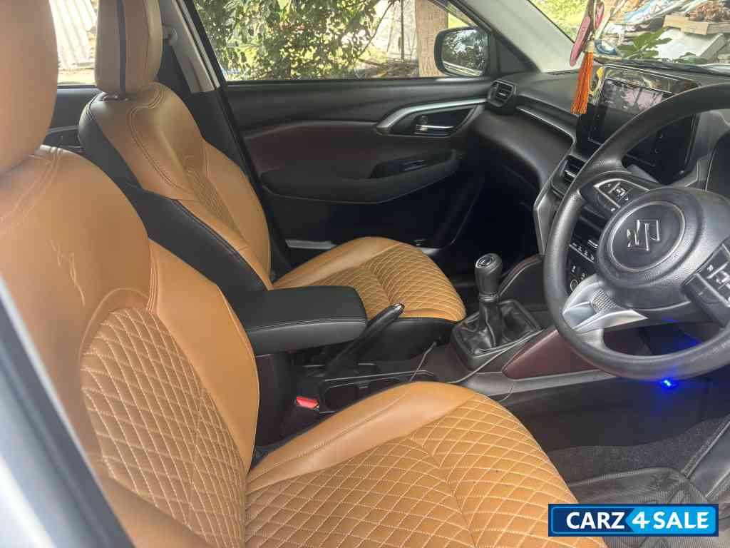 White Maruti Suzuki Grand Vitara Delta smart hybrid