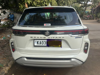 White Maruti Suzuki Grand Vitara Delta smart hybrid
