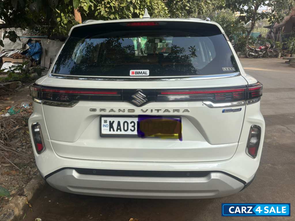 White Maruti Suzuki Grand Vitara Delta smart hybrid