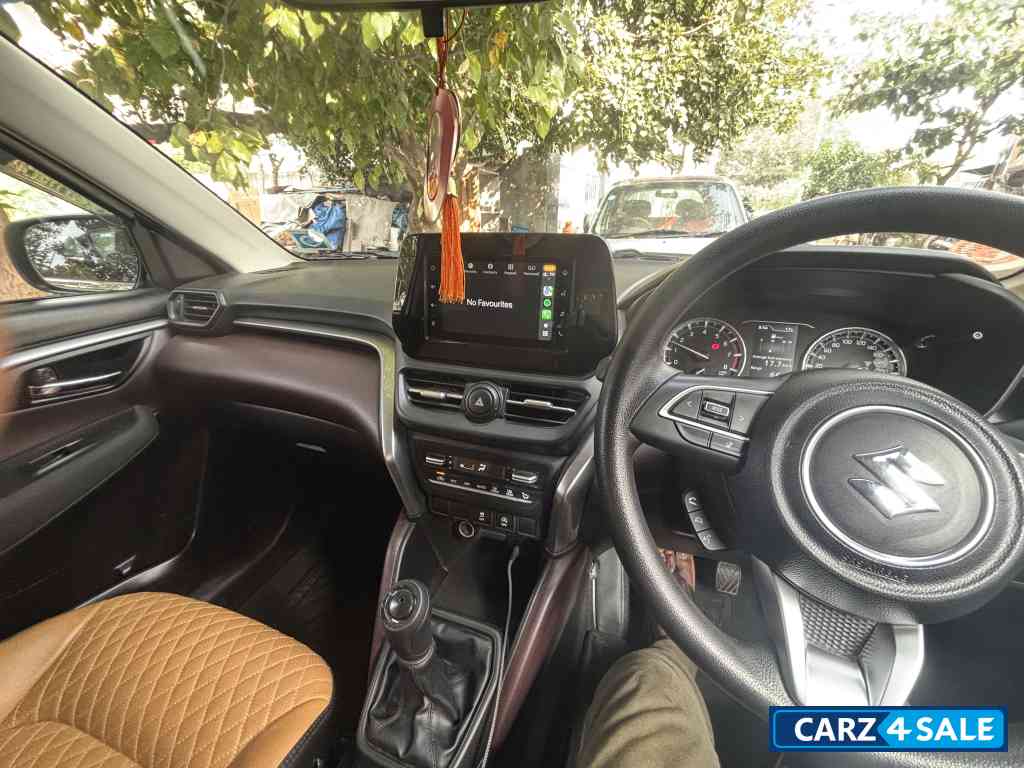 White Maruti Suzuki Grand Vitara Delta smart hybrid