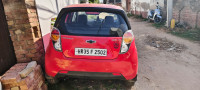 Super Red Chevrolet Beat ls petrol