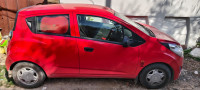 Super Red Chevrolet Beat ls petrol
